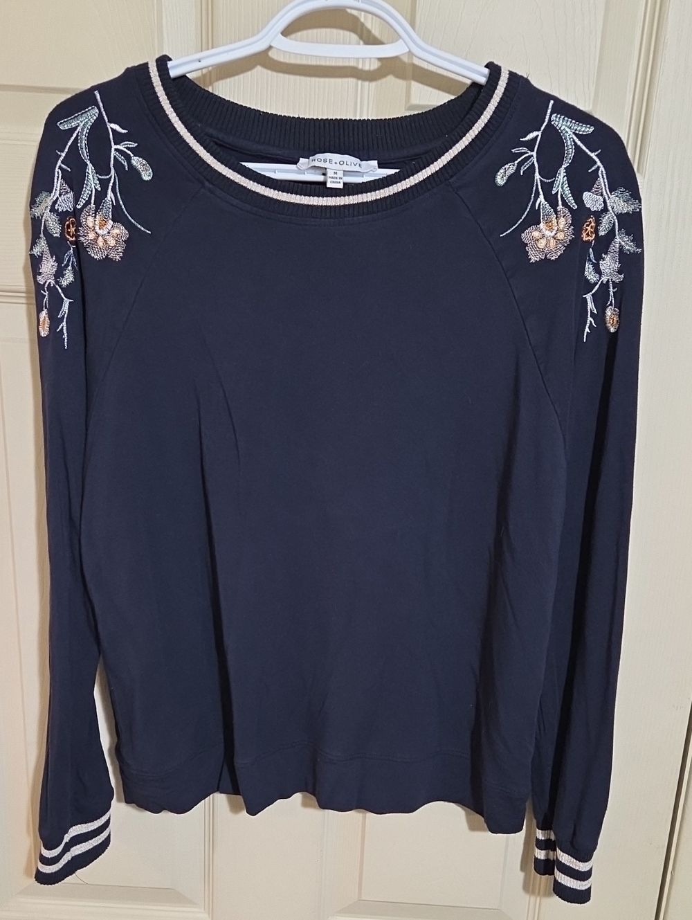 Rose & Olive Navy Embroidered Shoulder Sweatshirt with Pink Floral Accents
